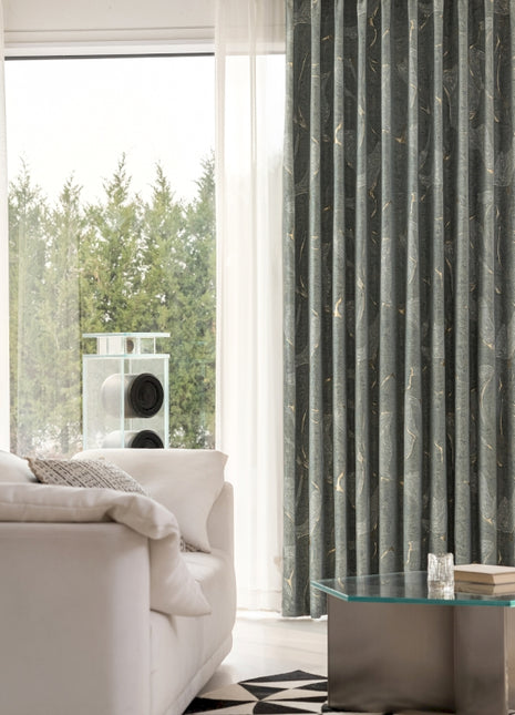 a living room filled with furniture and a large window