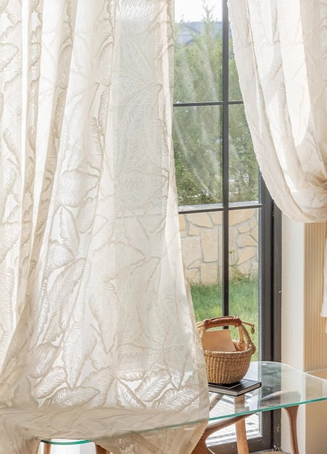 a glass table with a basket on top of it