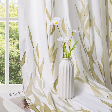a white vase filled with flowers on top of a window sill