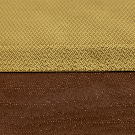 a close up of a brown and yellow fabric