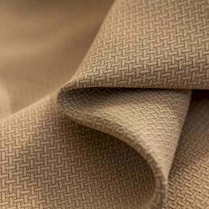a close up view of a tan fabric