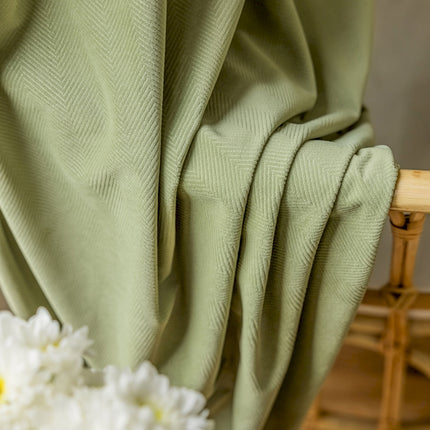 a close up of a chair with a flower on it