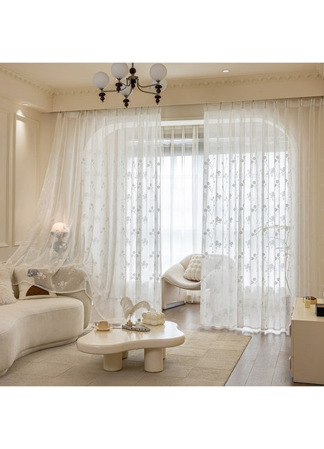 Transparente, bestickte Blumenspitze im klassischen, raffinierten Stil
